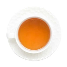 Load image into Gallery viewer, Brewed English Breakfast Tea in white cup showing deep reddish-amber infusion