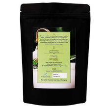 Load image into Gallery viewer, Close-up of organic whole leaf green tea showing fresh, unblended leaves