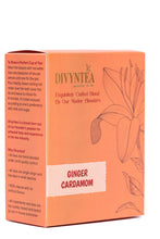 गैलरी व्यूवर में इमेज लोड करें, Brewed Ginger Cardamom Tea showing bright amber warming infusion in teacup

